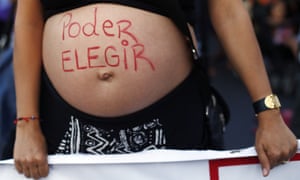 Santiago, Chile Demonstrators asked for the end of discrimination and the decriminalisation of abortion as the participate in a march to commemorate International Women’s Day. The text reads ‘ I can choose’