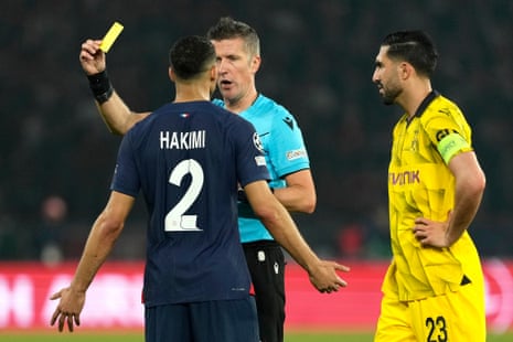 Achraf Hakimi is shown a yellow by referee Daniele Orsato.