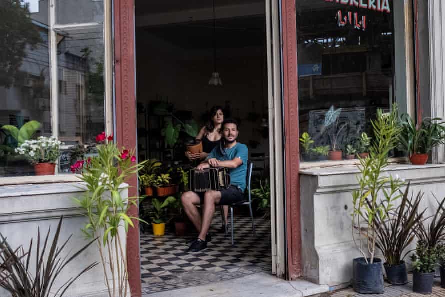 Nicolas Ponce and his girlfriend in their new shop with the tango-themed name Flores Negras.