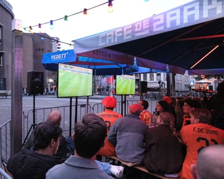 Fans astatine a cafe successful Utrecht watch nan Netherlands’ group-stage crippled against Japan