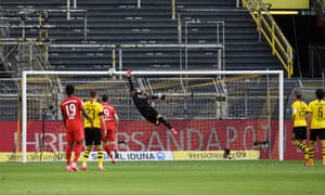 Borussia Dortmund keeper Roman Buerki is beaten by Joshua Kimmich’s shot and Bayern Munich have the lead.