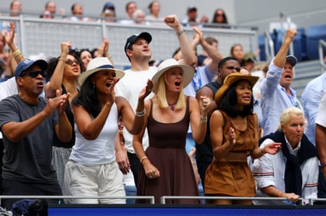 Spectators in the family box of Frances Tiafoe cheer during his quarter-final match against Alex Michelsen.