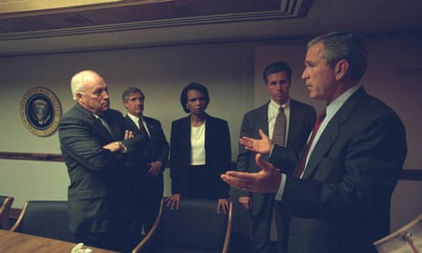 George Bush is pictured with Dick Cheney and senior staff in the President’s Emergency Operations Center in Washington in the hours following the 9/11 attacks in this US National Archives handout photo.