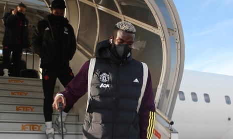 Paul Pogba and the Manchester United squad arrive in Paris.