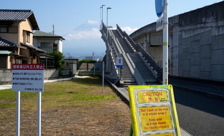 Warning signs near Fujisan Yumeno Ohashi, or Mount Fuji's Great Dream Bridge, amid complaints from crowds of tourists.