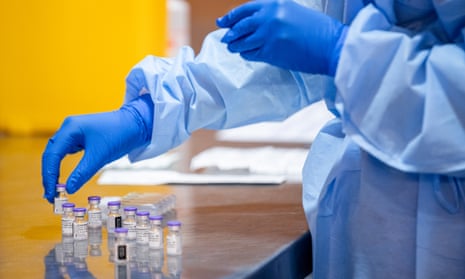 Medical workers prepare the Pfizer coronavirus vaccine at the Hyatt Perth quarantine hotel in February