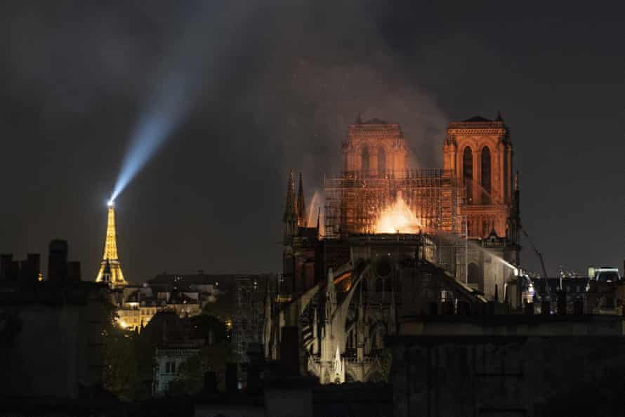 Smoke and flames rise from Notre Dame Cathedral following a devastating fire that quickly spread across the building and brought the spire to collapse. 15 April, 2019