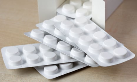 An open box of of 100 round tablets in blister packs