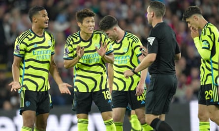 Takehiro Tomiyasu (No 18) is sent off for a second booking