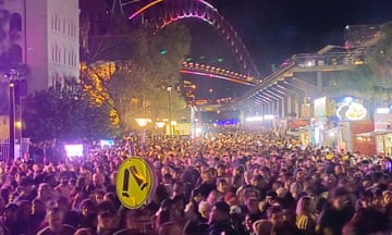 Image from Vivid Sydney 2024 Saturday 8th of June. A large crowd gathered to watch the drone show at Sydney Harbour.