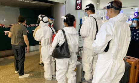 Travellers board flights from Taipei Travellers board flights from Taipei