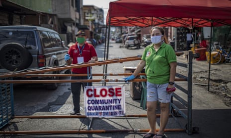 Residents of Manila’s poorer districts have begun putting up makeshift barricades to halt movement amid the coronavirus crisis