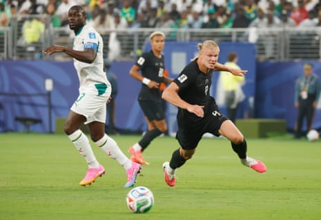 Erling Haaland goes after the ball in the