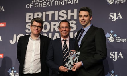 Head of Sport Owen Gibson (left) and website editor James Dart (right) receive the Sports Website of the Year award from Andy Reed,director of the Sports Think Tank at Loughborough University.