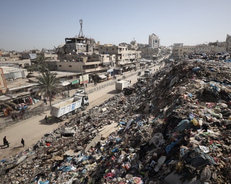 aerial view of buildings next to rubble
