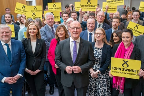 John Swinney with supporters after announcing that he is standing to be SNP leader and first minister.