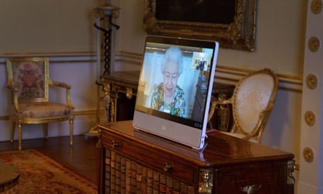 Queen Elizabeth II appears on a screen via videolink from Windsor Castle.