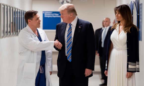 Donald and Melania Trump visit a hospital in Florida