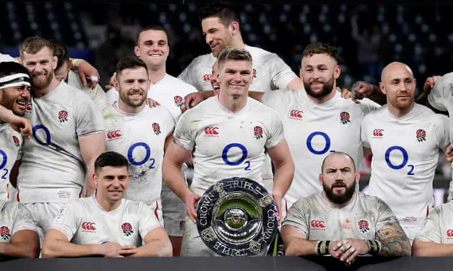 Owen Farrell with the triple crown shield after England beat Wales in March.