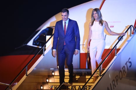 Spain’s Prime Minister Pedro Sanchez and his wife Begona Sanchez arrive at Kansai airport in Izumisano city, Osaka prefecture.