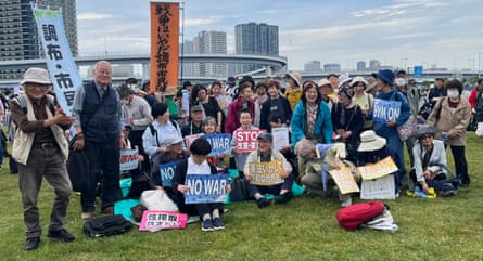 People protest in support of Japan’s pacifist constitution in Tokyo on Sunday 3 May