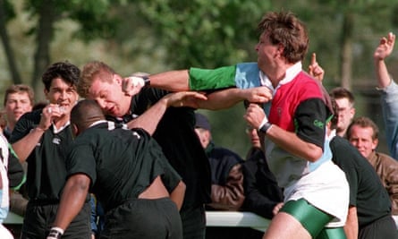 Harlequins’ Troy Coker lands a straight right to the head of Norman Hadley