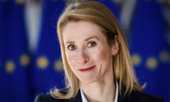 Kaja Kallas smiling with EU flag in background
