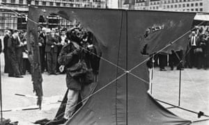 Metzger working on a painting.