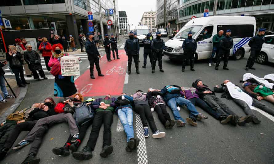 Members of the climate action group Extinction Rebellion during a protest at Rue de la Loi in Brussels.