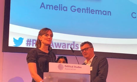 Amelia Gentleman receives her award at the Political Studies Association ceremony in London