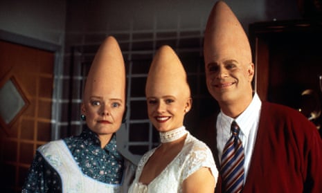 Jane Curtin, Michelle Burke and Dan Aykroyd in Coneheads, a movie maintains its lightness through the delight of its language.