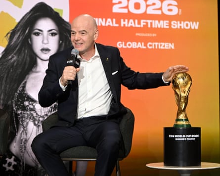 Gianni Infantino with the World Cup trophy.
