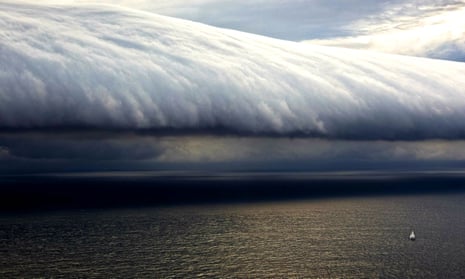 A yacht approaches a storm front off Tasmania.