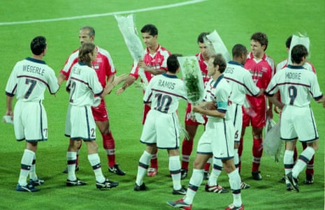 Iran’s players gift their US counterparts flowers as a gesture of peace ahead of their 1998 tie in Lyon