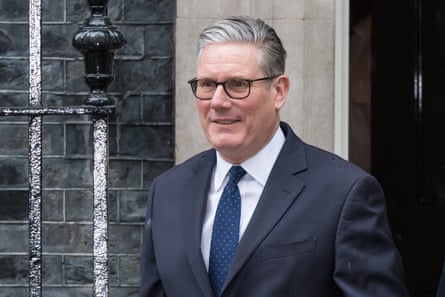 Keir Starmer wearing a dark suit outside No 10
