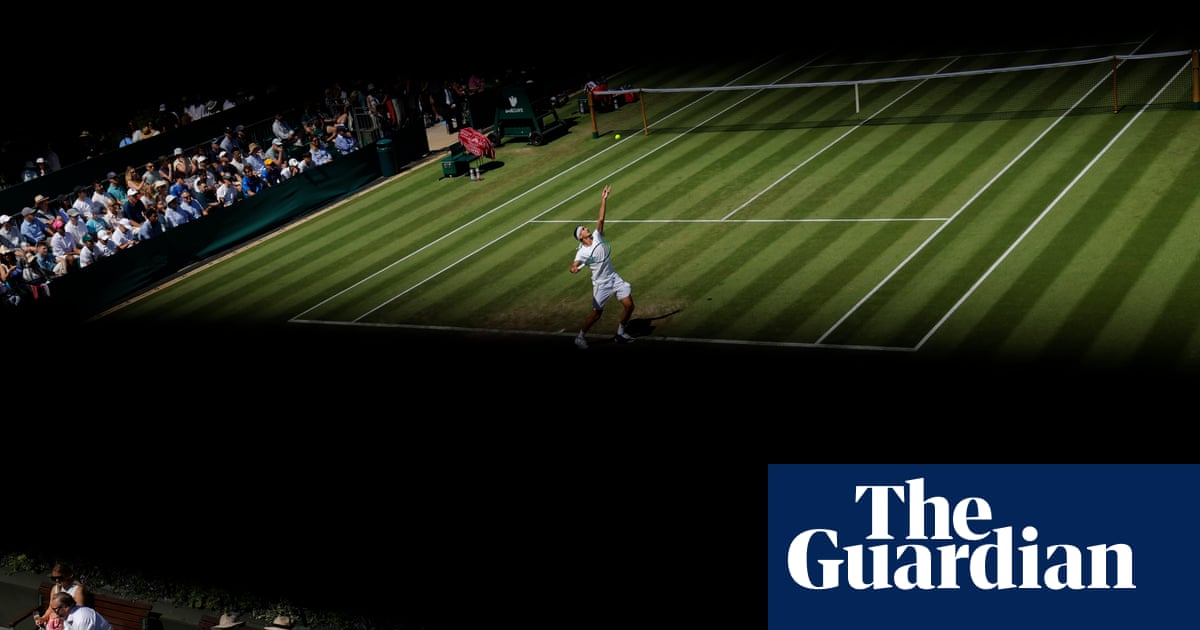 Serves, strawberries and shadows: Tom Jenkins’ best shots of Wimbledon 2026 – in pictures