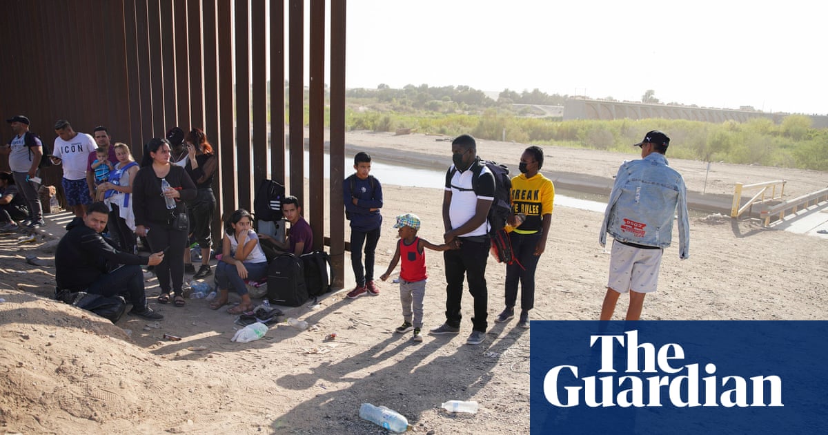 Clothes, shoes, passports: Migrants forced to dump possessions at US-Mexico wall