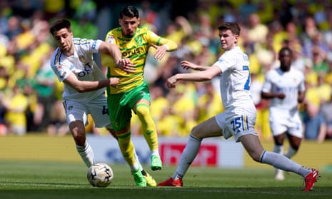 Dimitris Giannoulis of Norwich City takes on Llia Gruev of Leeds United.