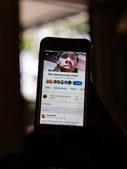 image of phone showing facebook group titled ‘who murdered my child?’