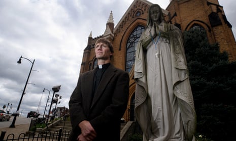 Father Michael Stumpf stands outside of St Mary of the Mount Church.