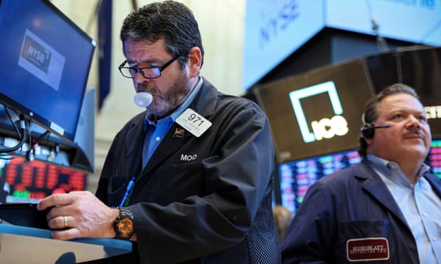 Traders on the floor of the New York Stock Exchange today