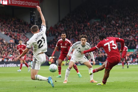Rio Ngumoha of Liverpool scores his team’s first goal while under pressure from Timothy Castagne and Harry Wilson of Fulham.