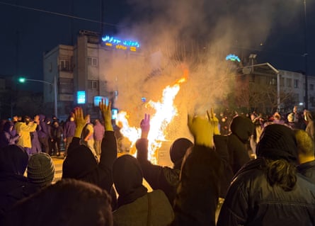 Iranians attend an anti-government protest in Tehran