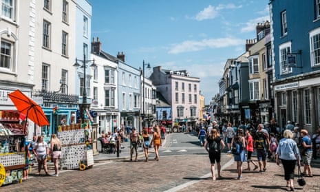 Tenby’s pastel-painted houses make an idyllic summer backdrop.