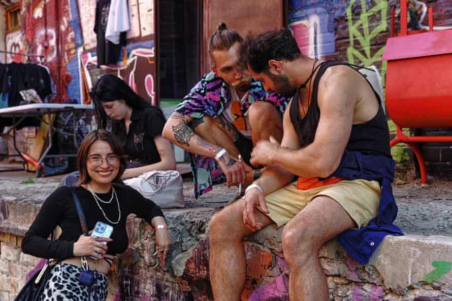 Festival guests hang outside the Mezzanine club.