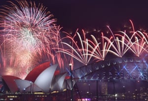 Fireworks light up the sky over Sydney’s opera house and harbour bridge