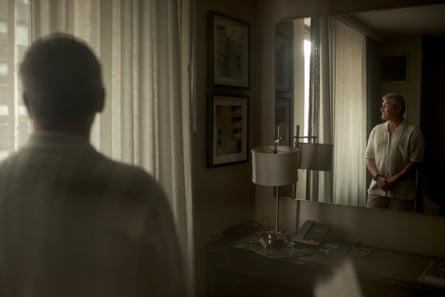 hunter near mirror in hotel room