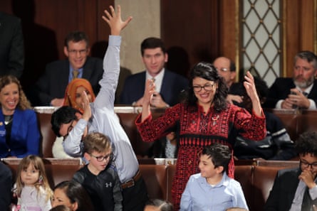Rashida Tlaib votes for Nancy Pelosi along with her kids during the first session of the 116th Congress at the U.S. Capitol.