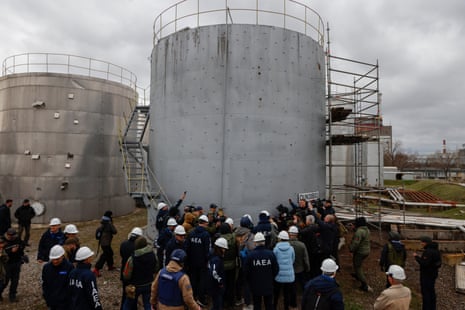 A picture taken during a visit organised by the Russian military shows a team from the International Atomic Energy Agency (IAEA) examining the Zaporizhzhia Nuclear Power Plant (ZNPP) in Enerhodar, southeastern Ukraine.