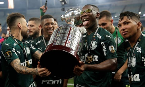 Palmeiras players celebrate with the Copa Libertadores trophy after their dramatic win over Santos.
